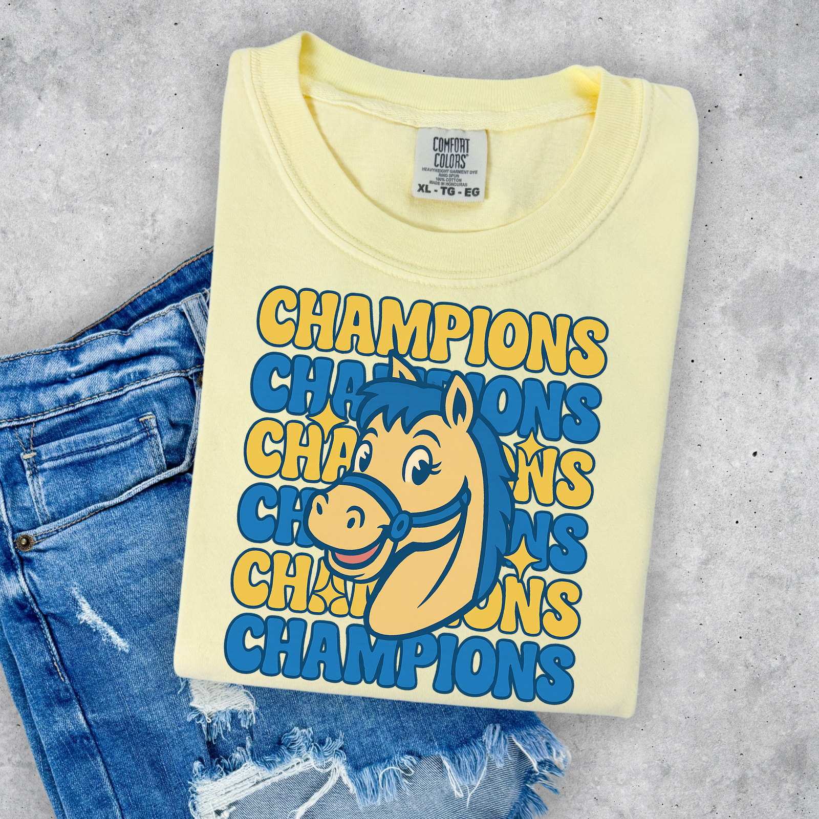 Champions Repeat Logo Tee: Butter